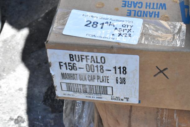 Cardboard box labeled "BUFFALO F156-0018-118, MANHAT BLK CAP PLATE, 6 3/8," with auction info indicating lot of 22 items.