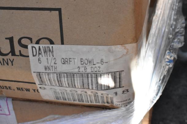 Box labeled "DAWN 6 1/2 QRFT BOWL," containing 2 dozen new scratch and dent dishware items wrapped in plastic.
