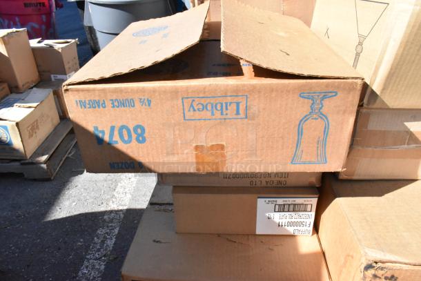 Boxes of various dishware, some labeled "Libbey." Condition: new, scratch and dent. Total: 25 items in auction.