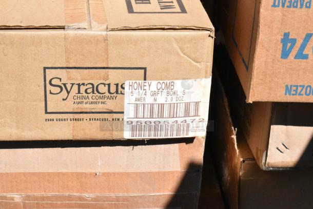 Box of new dishware from Syracuse China, labeled "Honey Comb, 5 1/4 GRFT Bowl, 2 doz." Item may have scratch and dent.