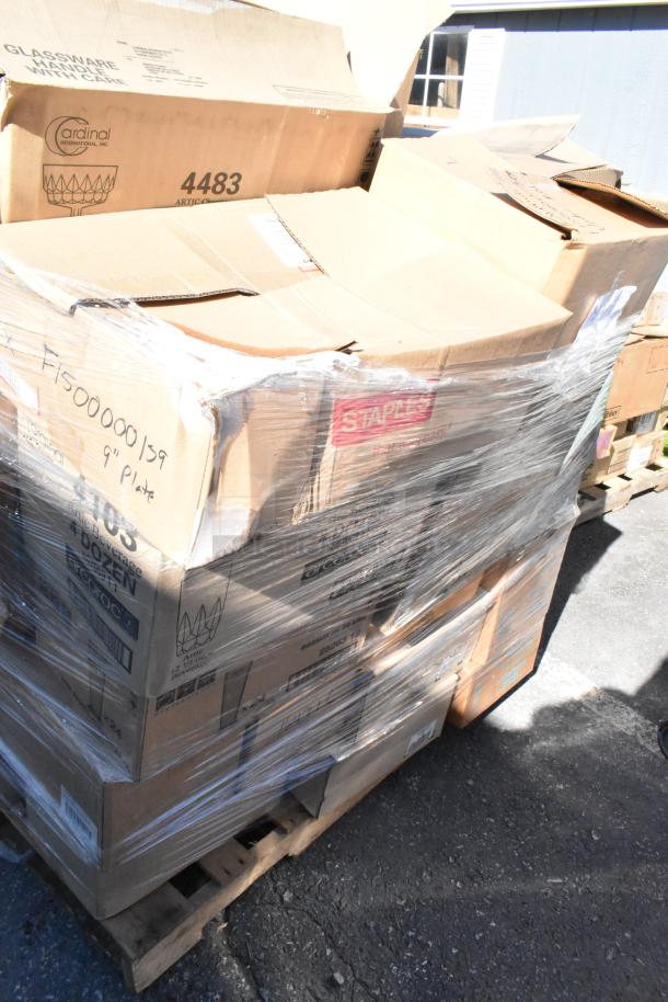 Pallet of 42 scratch and dent dishware boxes, various brands like Cardinal; visible glassware care labels.