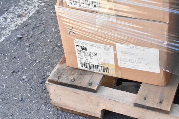 Cardboard box with Anchor Hocking Clarisse 8 oz rocks glasses, quantity 36, on a pallet, wrapped in plastic.