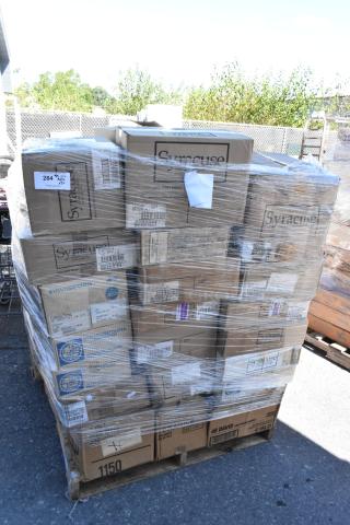 Pallet of boxed dishware and glassware by Syracuse China, shrink-wrapped, labeled "scratch and dent," 52 items included.