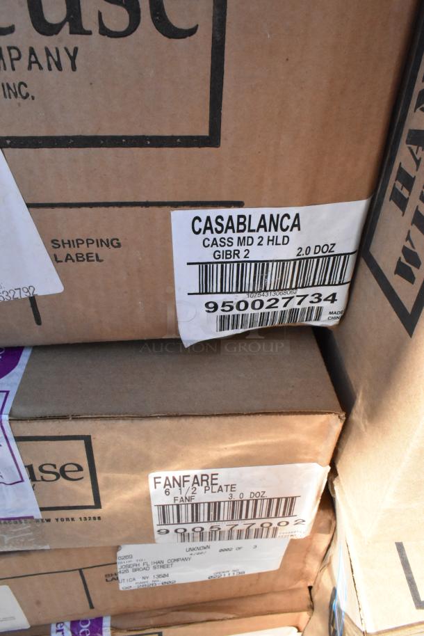 Boxes containing 52 new scratch and dent dishware items, labeled "Casablanca" and "Fanfare," various types, sold as-is.
