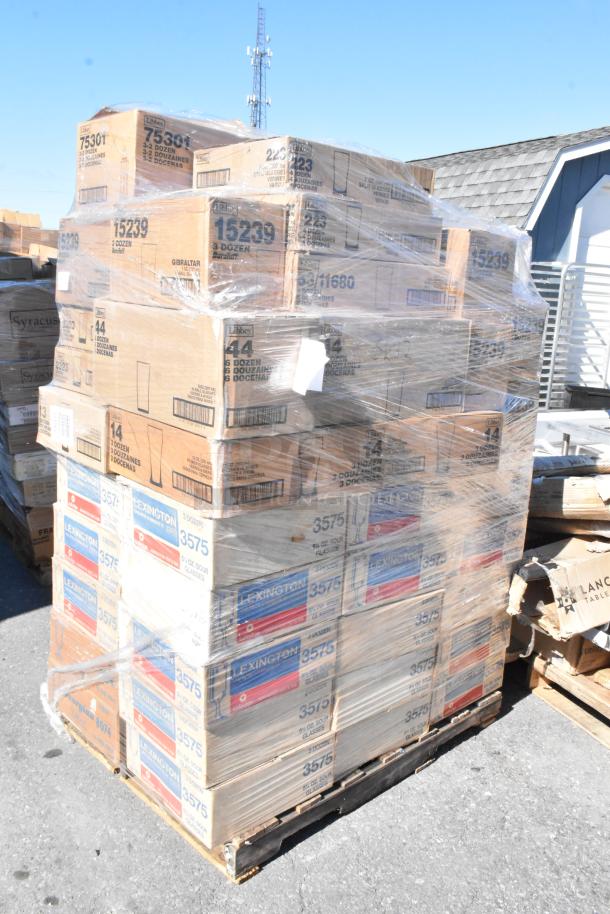 Pallet of 54 boxes containing brand new scratch and dent glassware, wrapped in clear plastic. Labels show various brands.