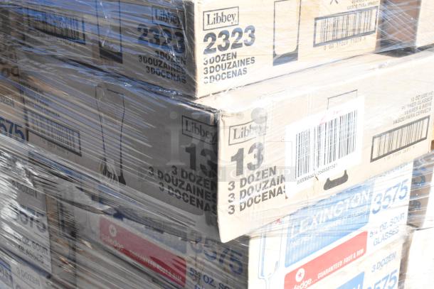 Boxes of Libbey glassware, new with minor scratches and dents, 54 items total, marked with models 2323 and 3575.