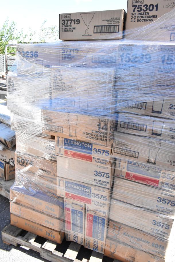 Pallet of boxed glassware with various Libbey items, brand new scratch and dent, wrapped in plastic, ready for auction.