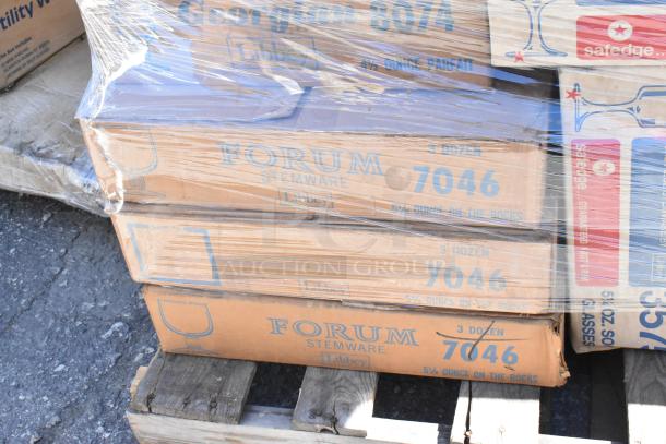 Boxes of Forum Stemware glassware, Libey brand, wrapped and stacked. Items are new with possible dents.