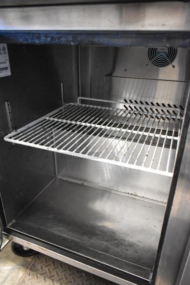 2017 Atosa MGF8402GR stainless steel undercounter cooler, 2 doors, commercial casters, interior shelving, 115V, 1 phase.
