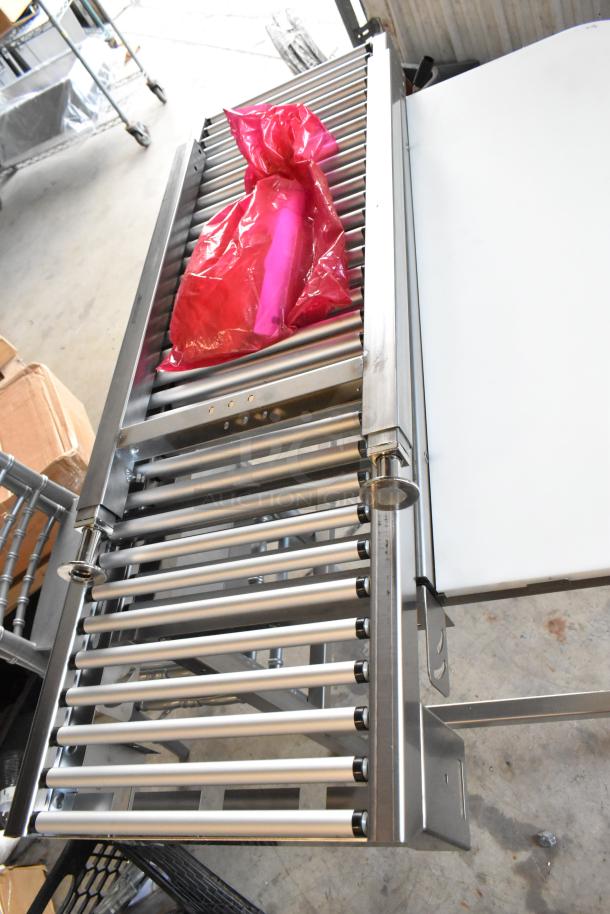 Hobart HRT5 stainless steel roller conveyor wrapping station, new condition with NIB conveyors, ideal for commercial use.