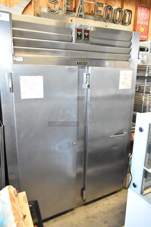 Traulsen AD232W-ZAB27 stainless steel commercial 2-door reach-in cooler and freezer. Doors need attachment. 115 volts, 1 phase.