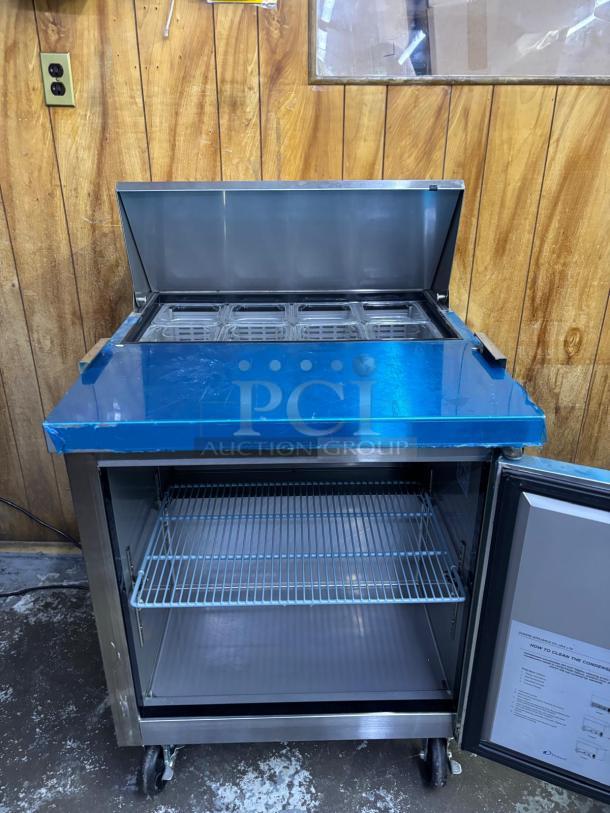 DUKERS DSP29 1-Door Commercial Food Prep Table Refrigerator, stainless steel, mega top, shelves, casters, good condition.