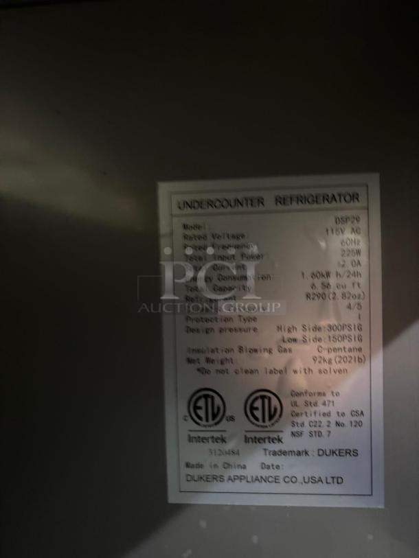DUKERS DSP29 1-Door Commercial Food Prep Table Refrigerator label. Stainless steel, ETL listed, 115V, 6.5 cu ft capacity.
