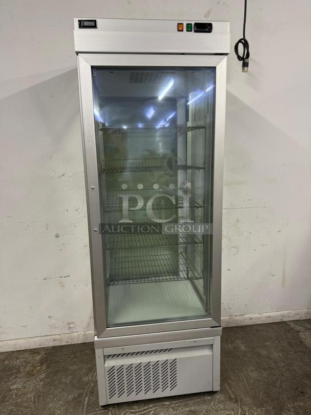 TEKNA 4400NFN glass refrigerated display case; four-sided, tested, working, shelves visible, ideal for product showcasing.