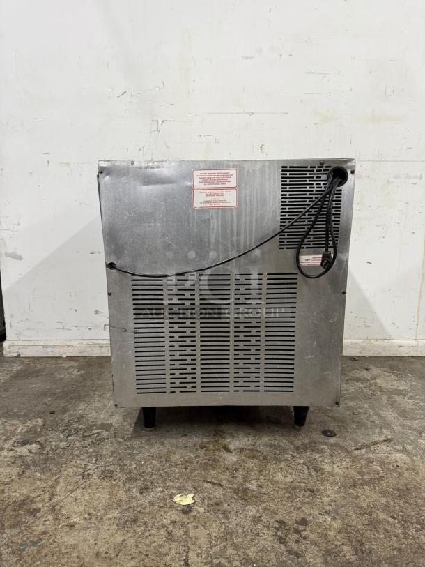 Silver King SKTTR7 undercounter refrigerator, used condition, visible cooling vents, electrical cord attached.