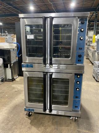 Duke Manufacturing stainless steel double-stacked convection oven, natural gas, thermostatic controls, wired racks, casters.