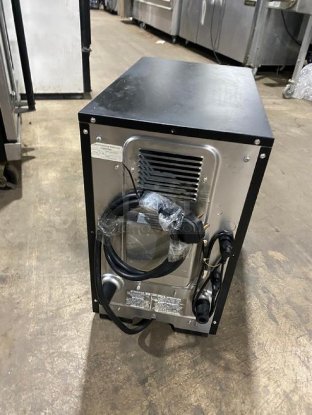 MerryChef countertop high-speed oven, electric powered, late model, black finish, 208/240V 1 phase, vent at rear.