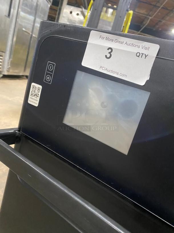 MerryChef commercial electric rapid cook oven, black, countertop model, 208/240V 1 Phase, touch controls, auction tag visible.
