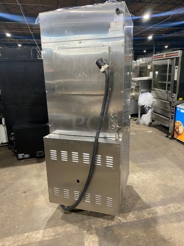 Wells VCS2000 ventless cooking system with 4 French hot plates, convection oven base, rear casters, front legs. Stainless steel.