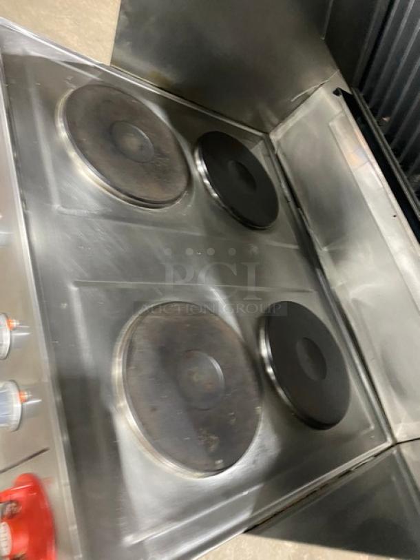 Wells VCS2000 ventless cooking system with 4 French hot plates and convection oven base. Stainless steel, on casters and legs.