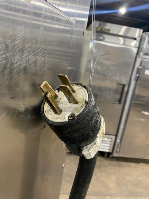 Wells VCS2000 stainless steel ventless cooking system plug detail, showing power connector. Features 4-French hot plate and convection oven.