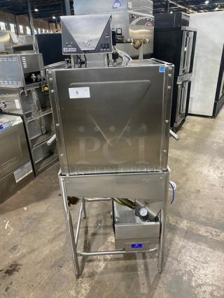 Commercial stainless steel electric dishwashing machine, Model ES2000, Energy Star certified, on legs, industrial setting.