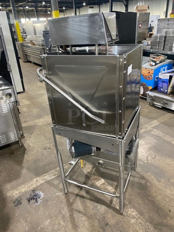 Stainless steel commercial electric dishwashing machine on legs, Model ES2000, Energy Star certified, in excellent condition.
