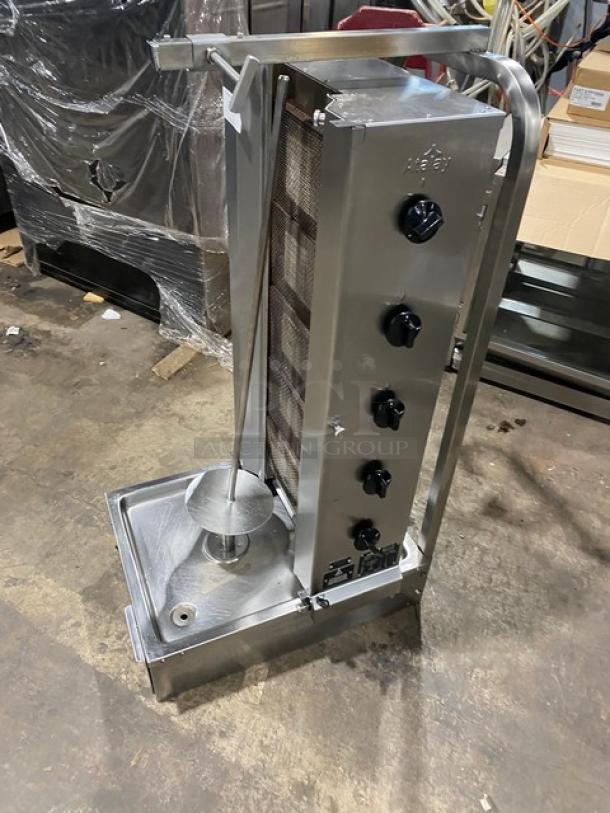 Atalay stainless steel gyro machine, model ADG5A, with 5 burners and individual controls, in used condition.