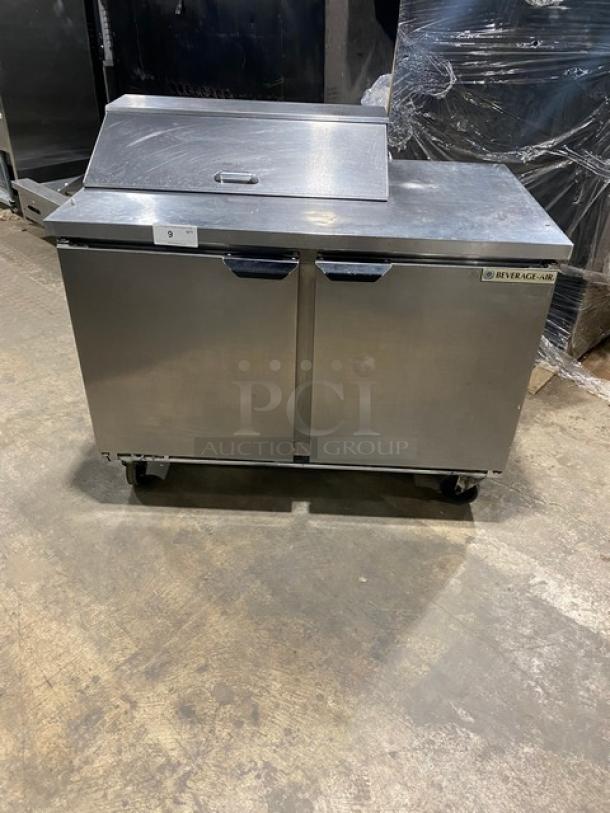 Beverage-Air stainless steel 2-door refrigerated prep table, model SPE48HC-08, on casters, with poly-coated wire racks.