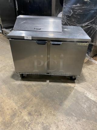 Beverage-Air stainless steel 2-door refrigerated prep table, model SPE48HC-08, on casters, with poly-coated wire racks.