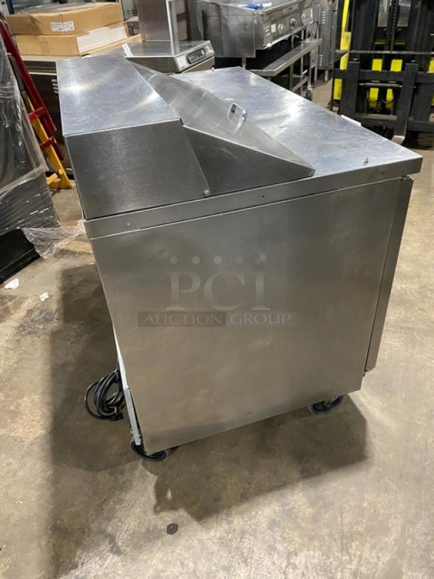 Beverage-Air 2-door stainless steel refrigerated prep table, model SPE48HC-08, on casters, featuring poly coated wire racks.
