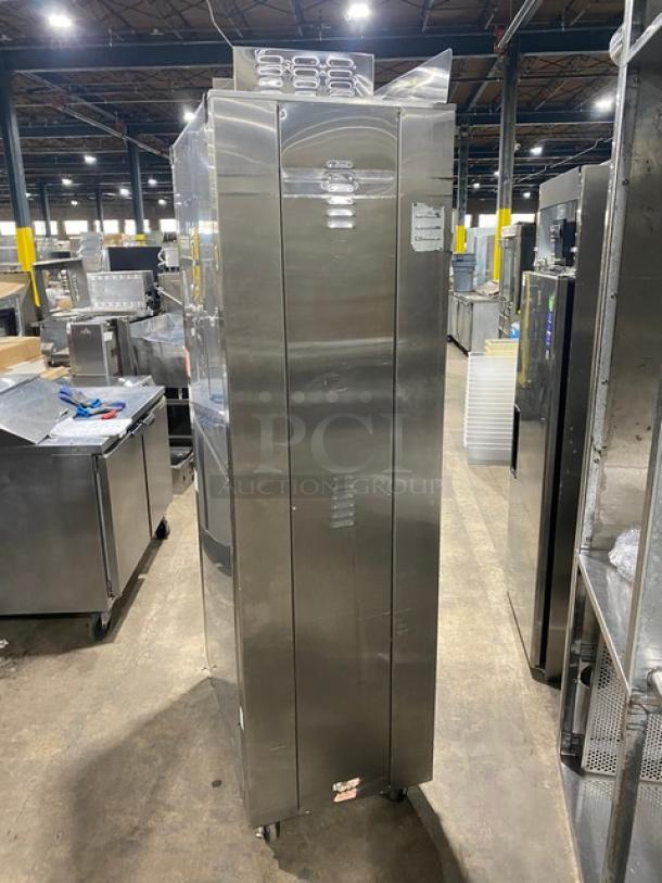 Nu-Vu OP-2FM stainless steel double stacked oven/proofer combo. Features thermostatic controls, wired racks, pan slides, and is on casters.