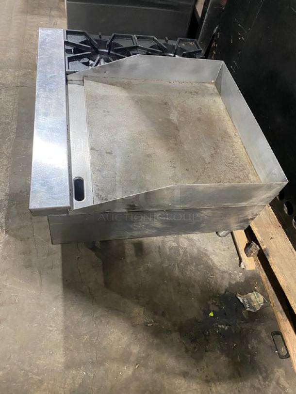 Comstock Castle stainless steel 2-burner countertop griddle range FHP3624, natural gas, with back and side splash, on legs.