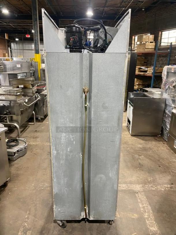 Continental single glass door refrigerator model 1R, stainless steel, Energy Star certified, on casters, with poly coated wire racks.