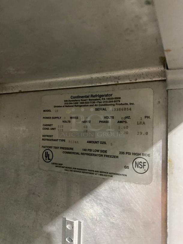Continental Commercial Stainless Steel Refrigerator, Model 1R, with glass swing door, poly coated wire racks, Energy Star certified, 115V, on casters, serial number 13386054.