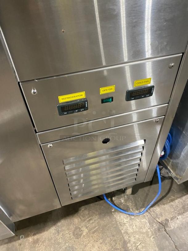 Commercial stainless steel 4-drawer refrigerated cold pan salad bar on casters, with digital controls for refrigerator and cold pan.