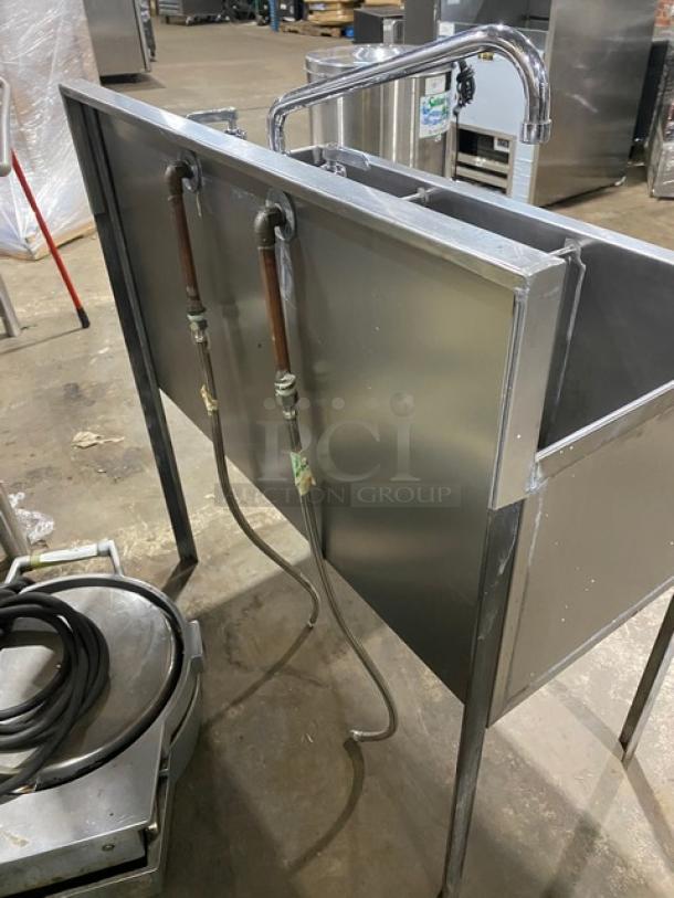Commercial stainless steel 3-compartment prep sink with backsplash, swivel swing-spout faucet, on legs, new condition.