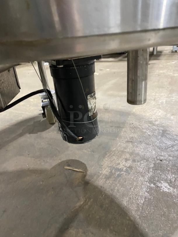 Delfield SALD-1 stainless steel 20-gallon electric salad dryer on casters, shows motor component.