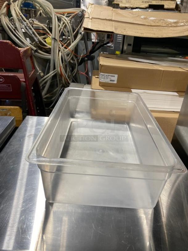 Cambro clear polycarbonate food pan, commercial-grade, rectangular shape, excellent condition, ideal for food storage.