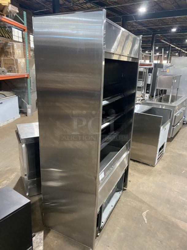 Structural Concepts Oasis Series stainless steel multi-tier refrigerated display case, model B42, SN: 1062076 JU322912, 120V 1 Phase.