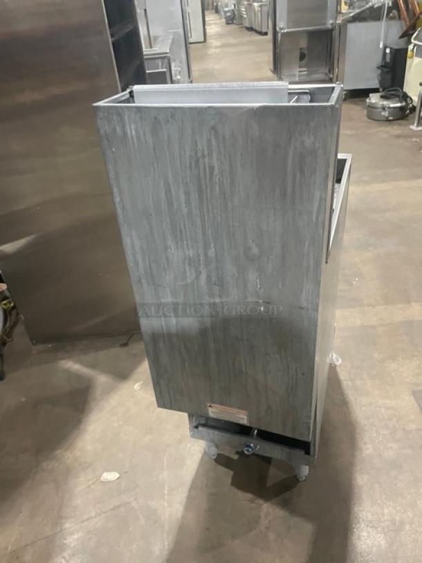 Pitco Frialator 40S commercial stainless steel 40 lb deep fat fryer with backsplash, on legs, liquid propane powered.