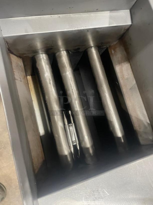 Pitco Frialator Model 40S commercial stainless steel deep fat fryer, liquid propane, 40 lb capacity, with backsplash, on legs.