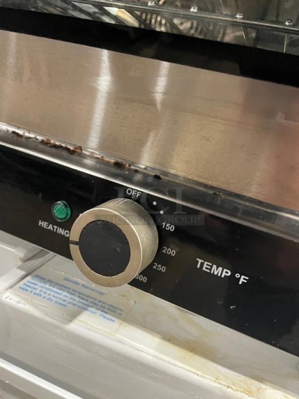 Kitma KMCC50 convection oven, stainless steel, 2020 model, thermostatic control, shown with temperature dial and heater indicator.