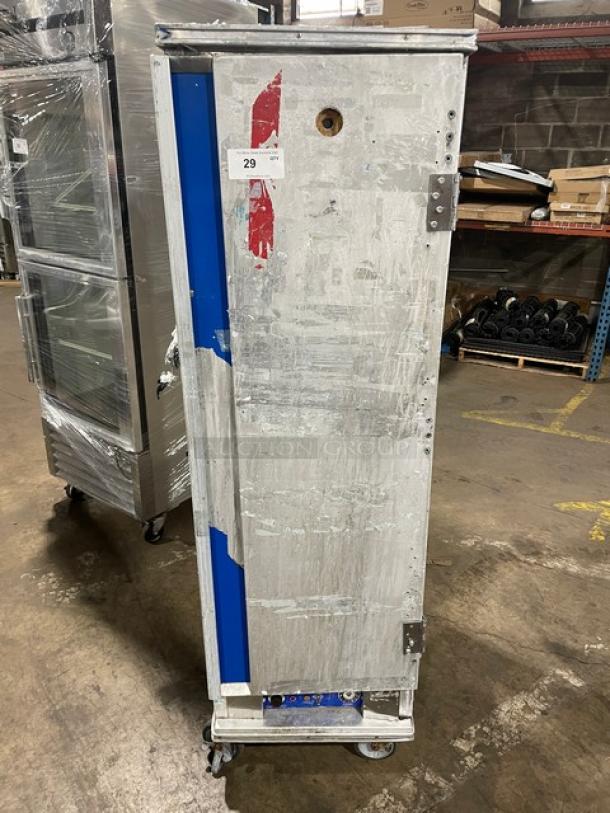 Precision electric heated holding/proofing cabinet, full-height, built-in pan slides, on casters, visible wear and tear.