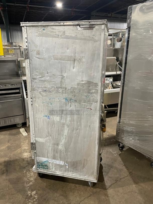 Precision electric heated holding/proofing cabinet, full-height, with built-in pan slides, on casters, used condition.