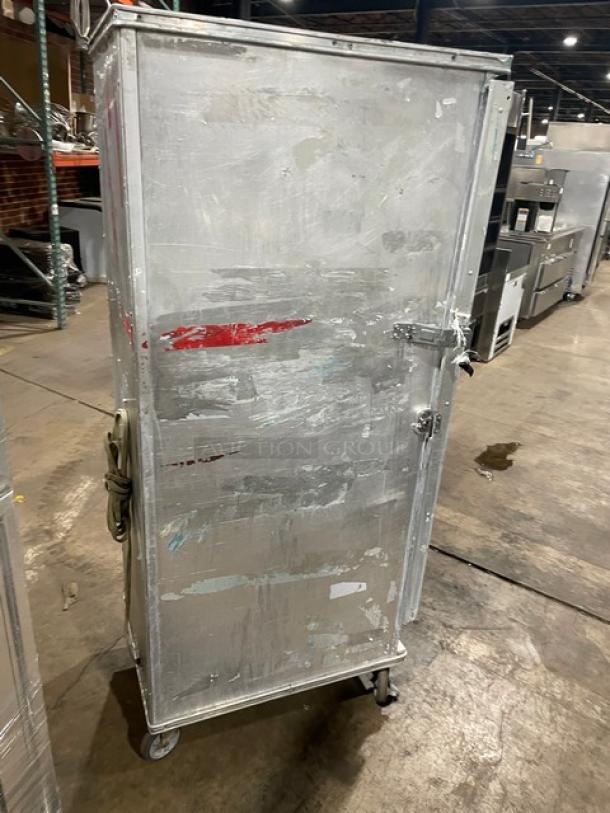 Precision commercial electric full-height heated holding/proofing cabinet, with built-in pan slides, on casters, used condition.