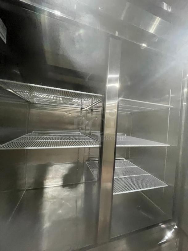 Atosa 2017 B-Series 2-door stainless steel commercial freezer, model MBF8503, with poly-coated wire racks, on casters.