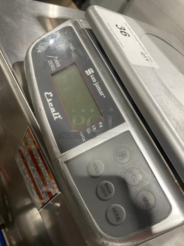 San Jamar Escali SCDGM66 digital scale, stainless steel, multi-function, 66 lb capacity, countertop model with legs.