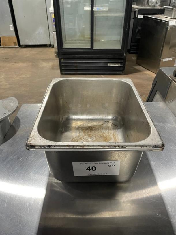 Commercial stainless steel hotel pan, rectangular, used condition, auction label "40 QTY," ideal for food service.