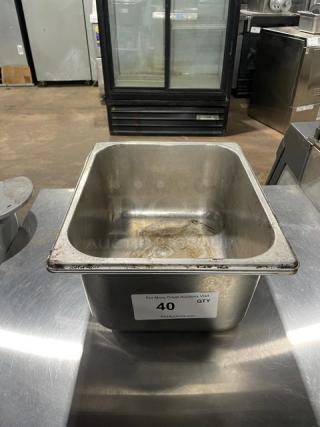 Commercial stainless steel hotel pan, rectangular, used condition, auction label "40 QTY," ideal for food service.